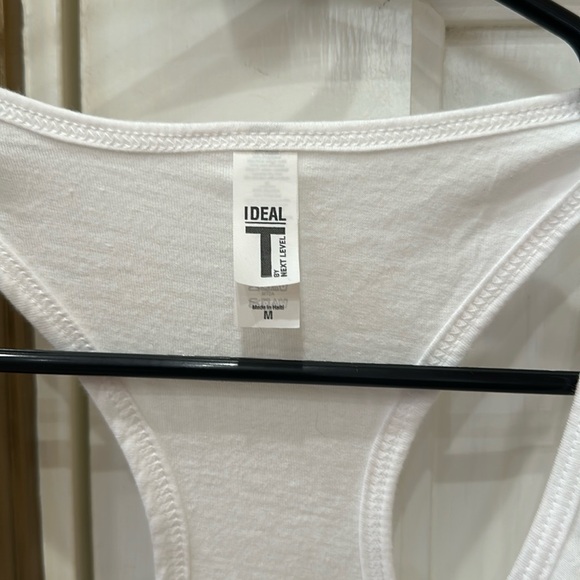 White tank “. Personally victimized by my Trainer”. - Picture 7 of 8